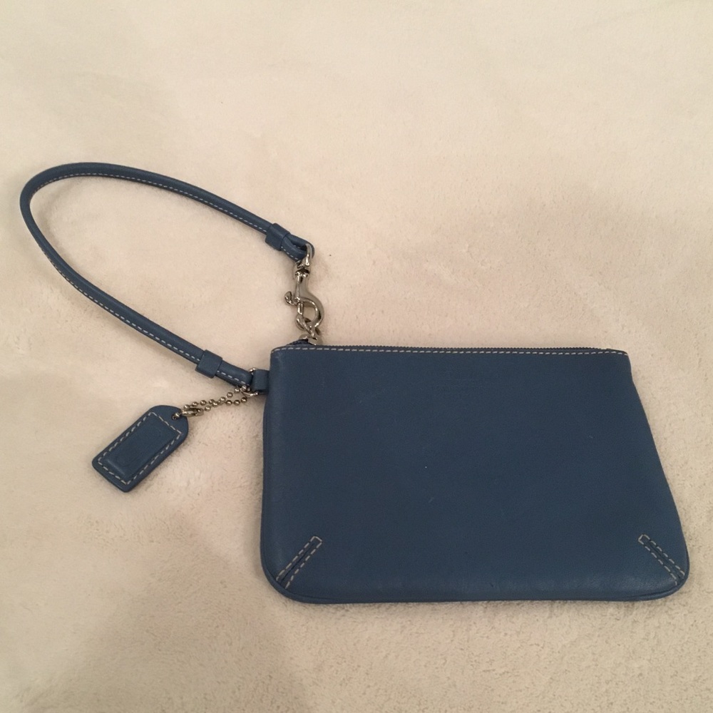 Blue Coach clutch w/ zipper across.